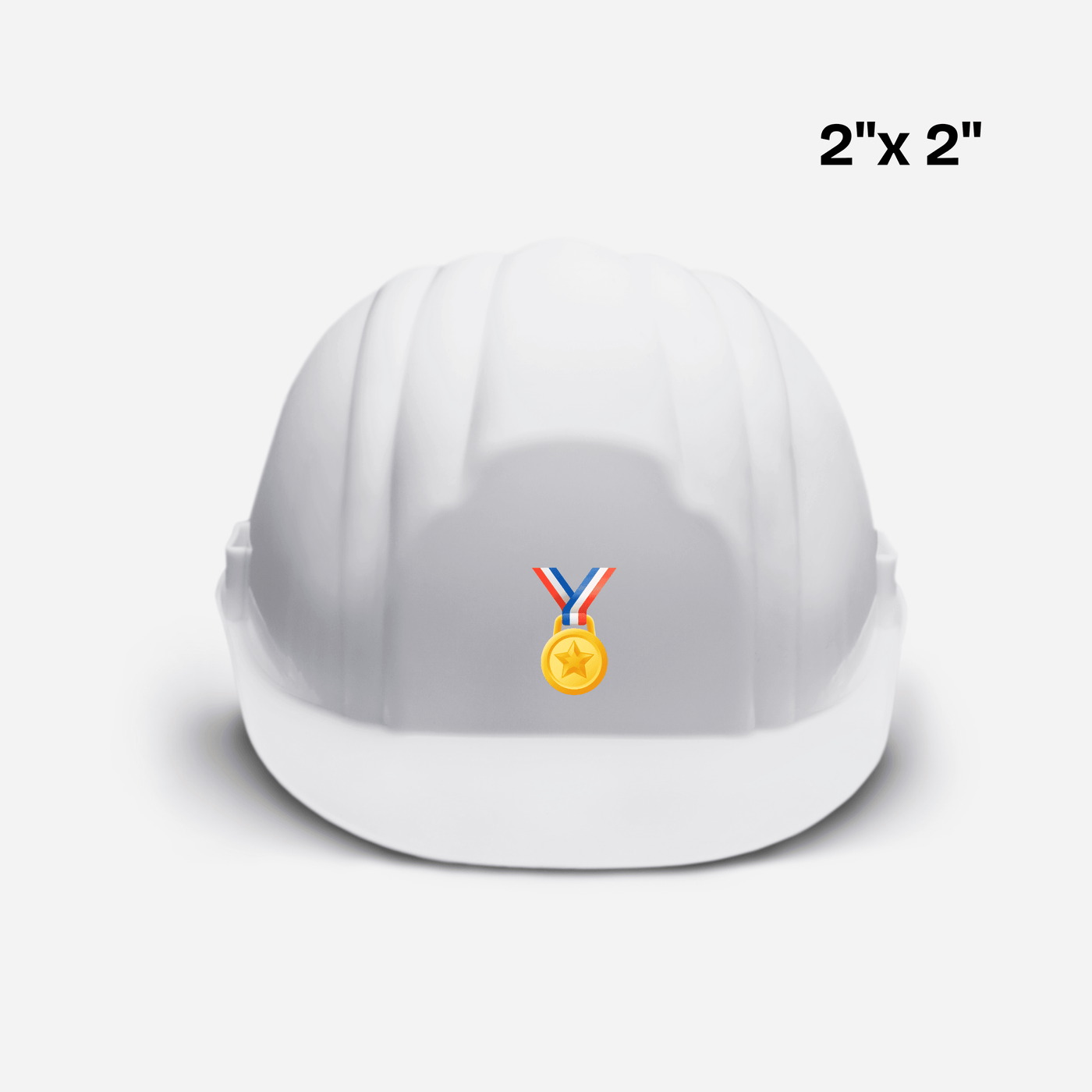 White hard hat with gold medal DTF transfer, 2x2 inch size for custom printing.