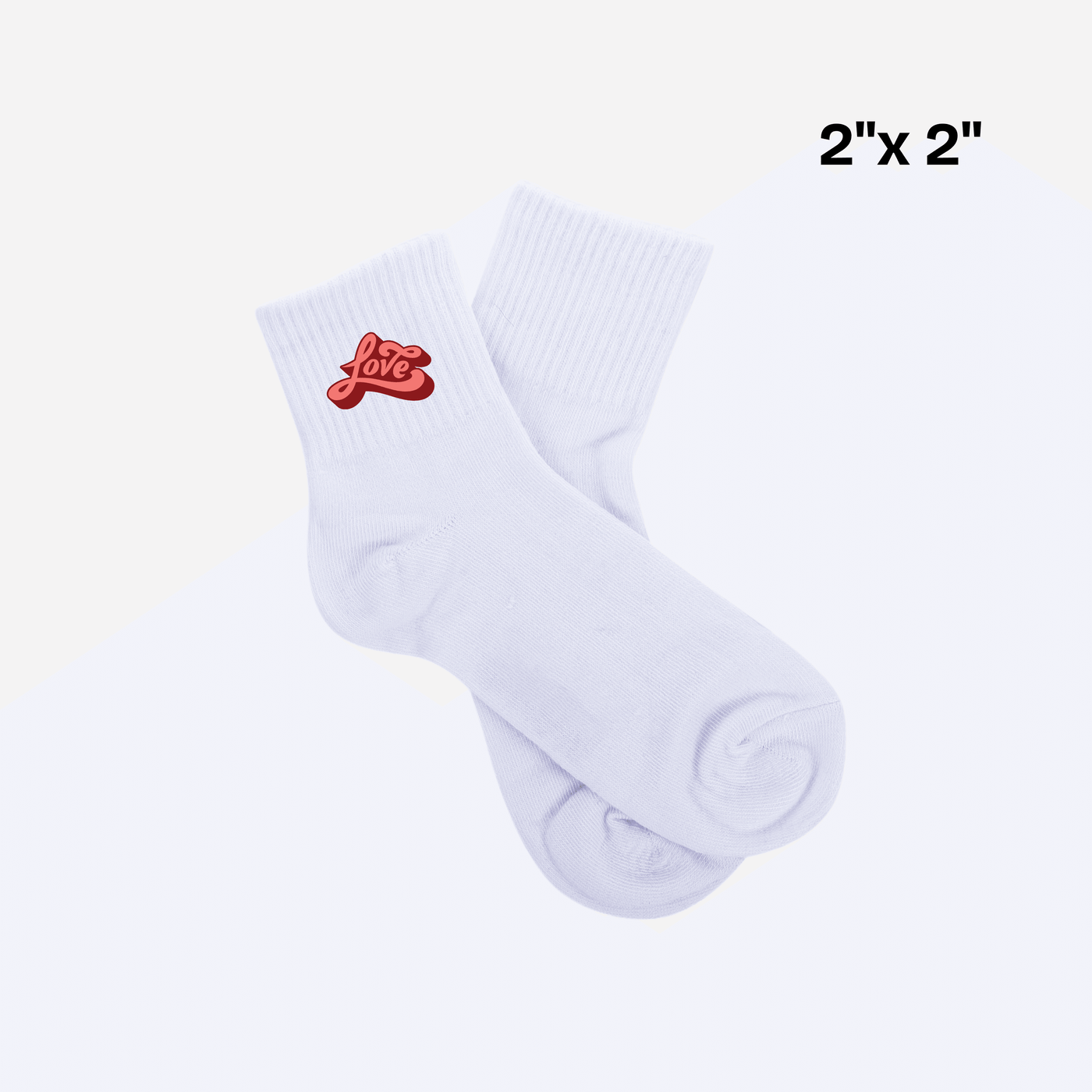 White socks with red 'love' DTF transfer design, sample 2x2 inch custom print