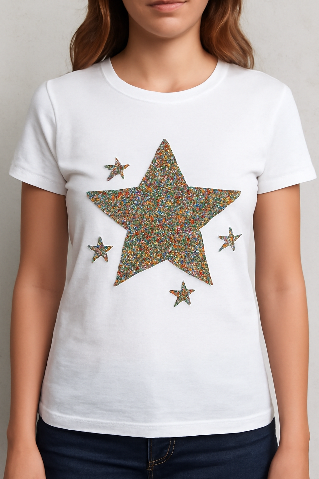 White t-shirt with colorful glitter star DTF transfer design on front